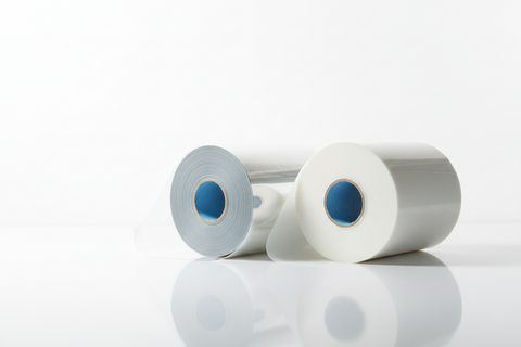 UV DTF A&B film rolls for custom transfer printing on a clean white background.